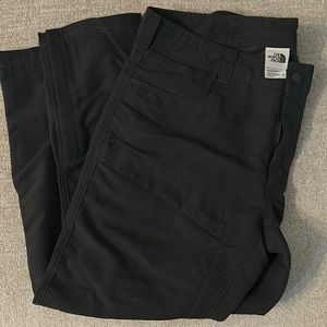 The North Face Men’s active pants, size 36, charcoal grey.